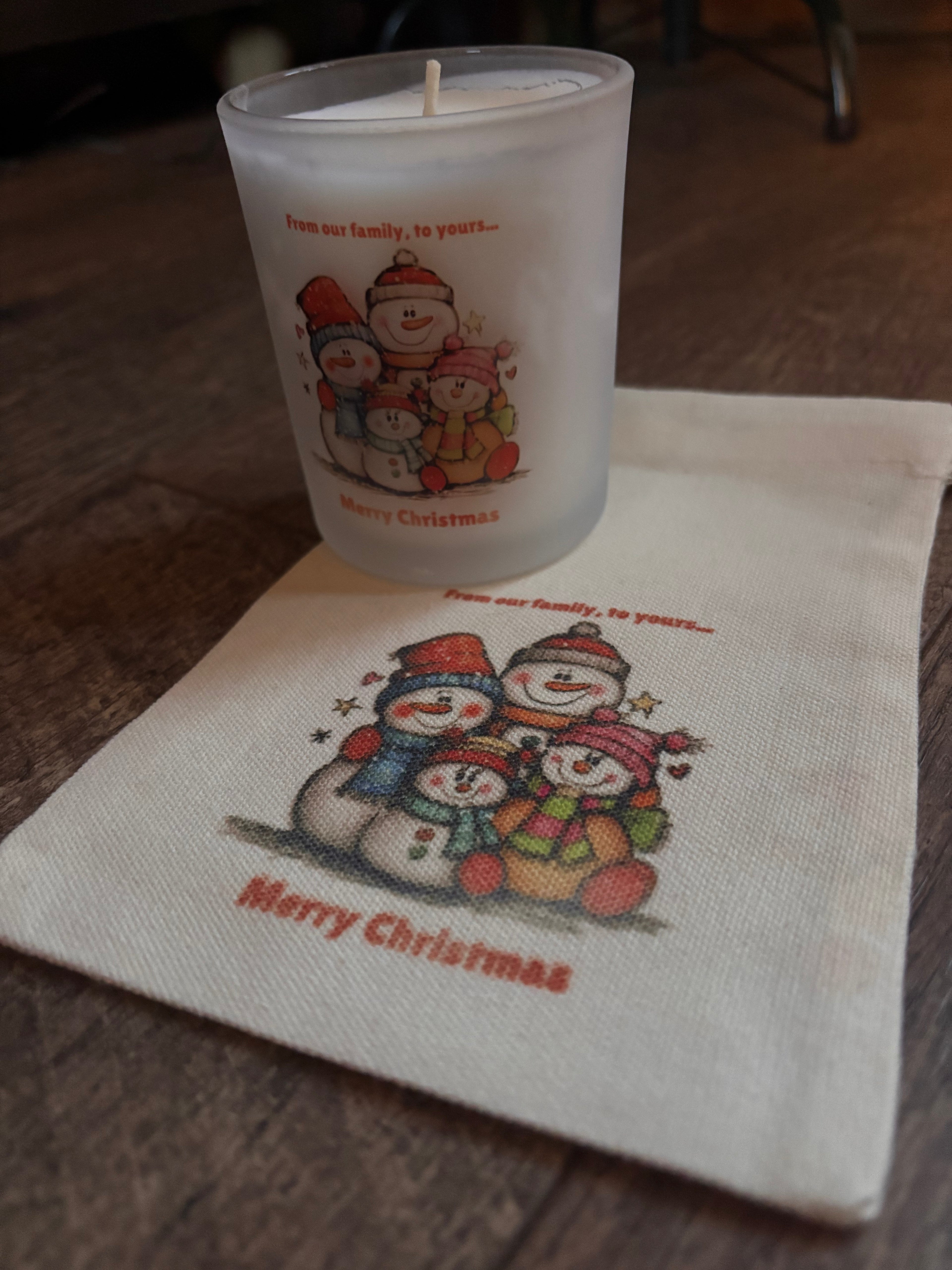 From our family to yours, snowman candle and gift bag