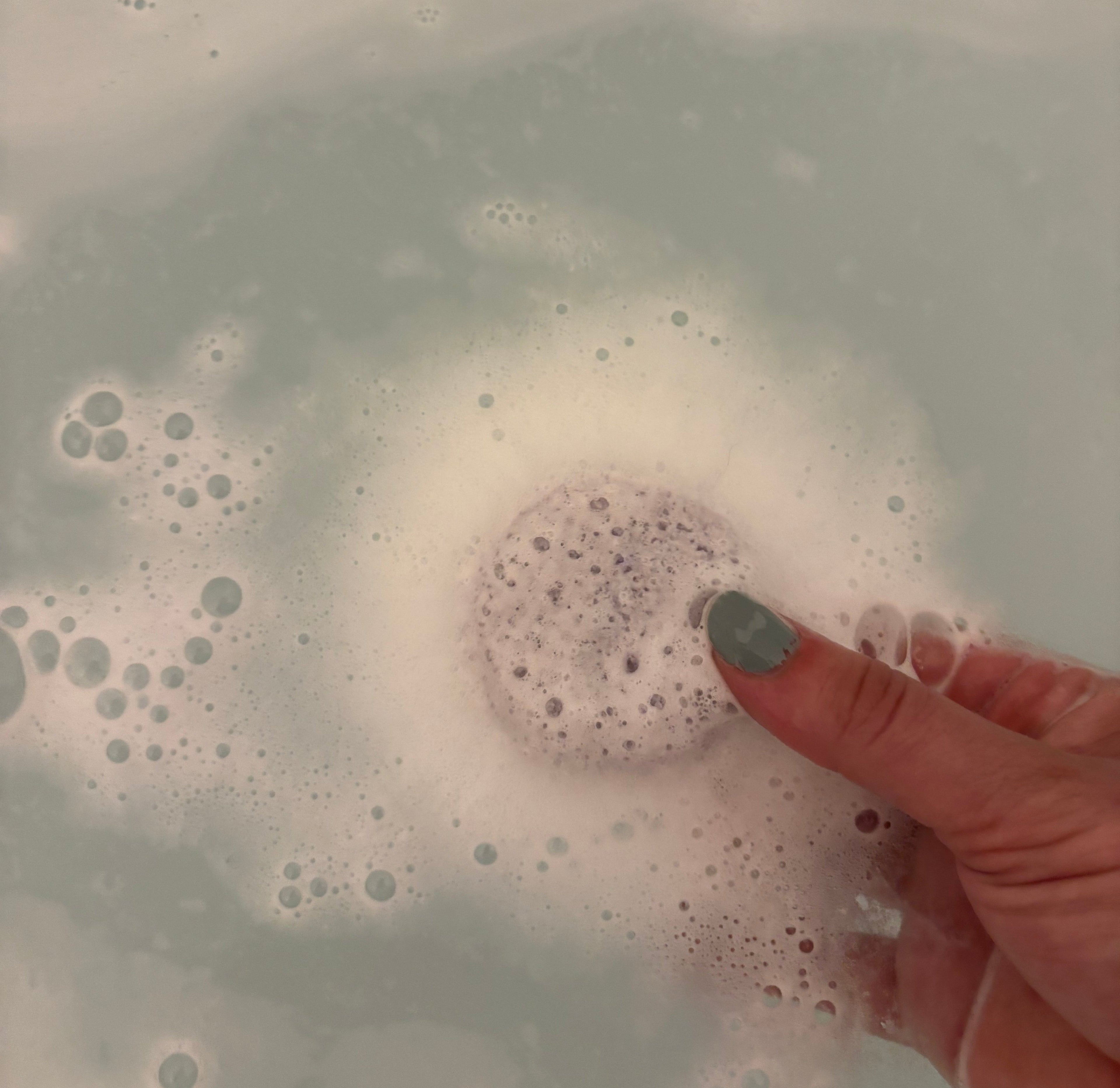 scentia essential oil chakra bath bombs fizzing in  a bath
