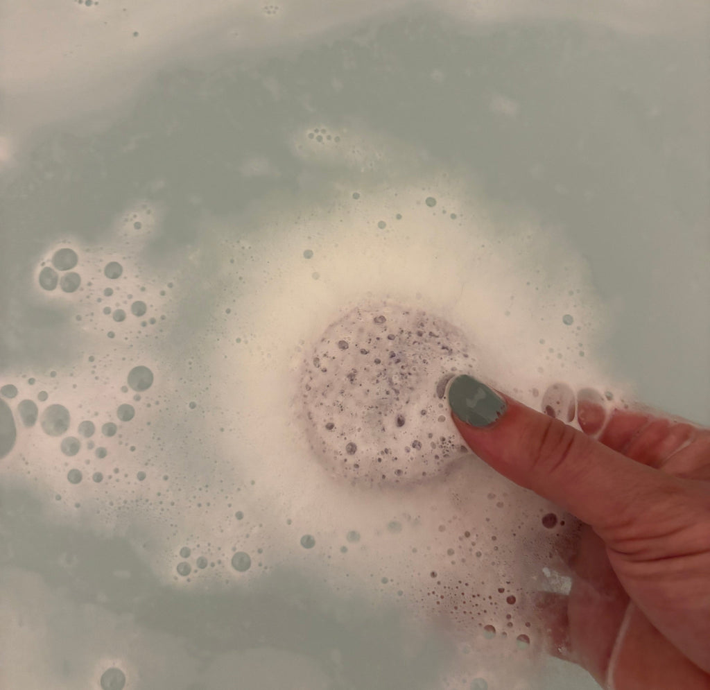 scentia essential oil chakra bath bombs fizzing in  a bath